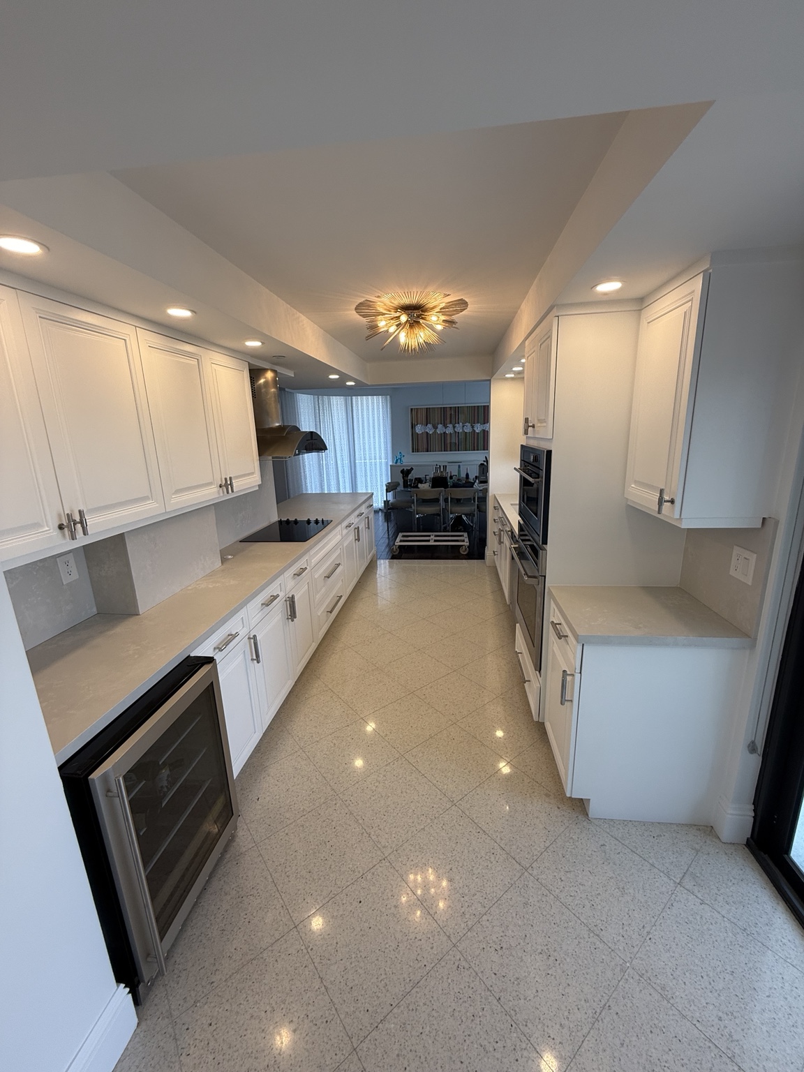 Wide finished kitchen cabinet view